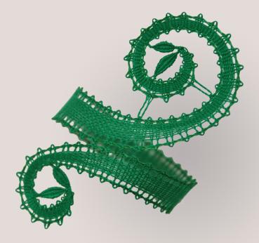 Preview: 264 Klöppelbrief Serviettenring „Immergrün“